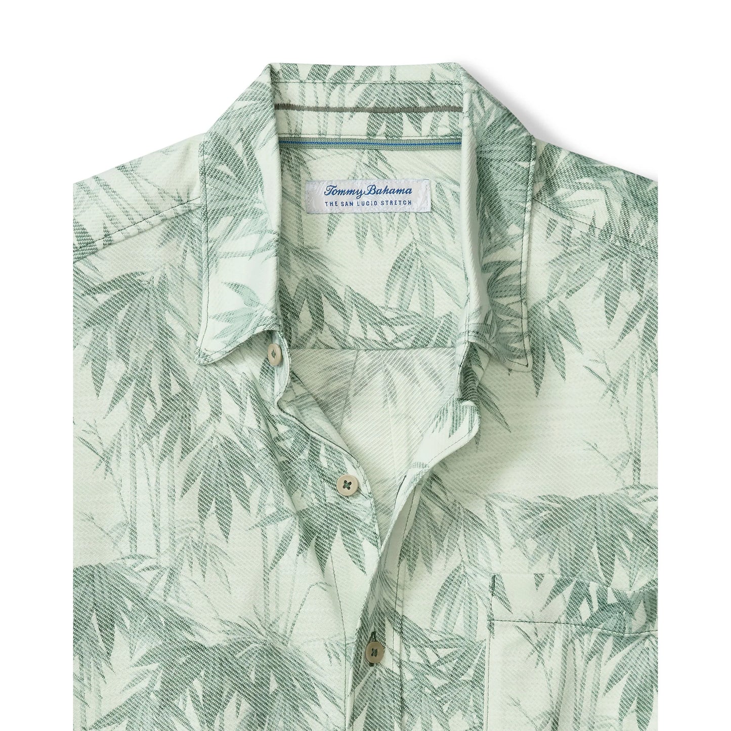 Tommy Bahama shirt with green leaf pattern on a white background