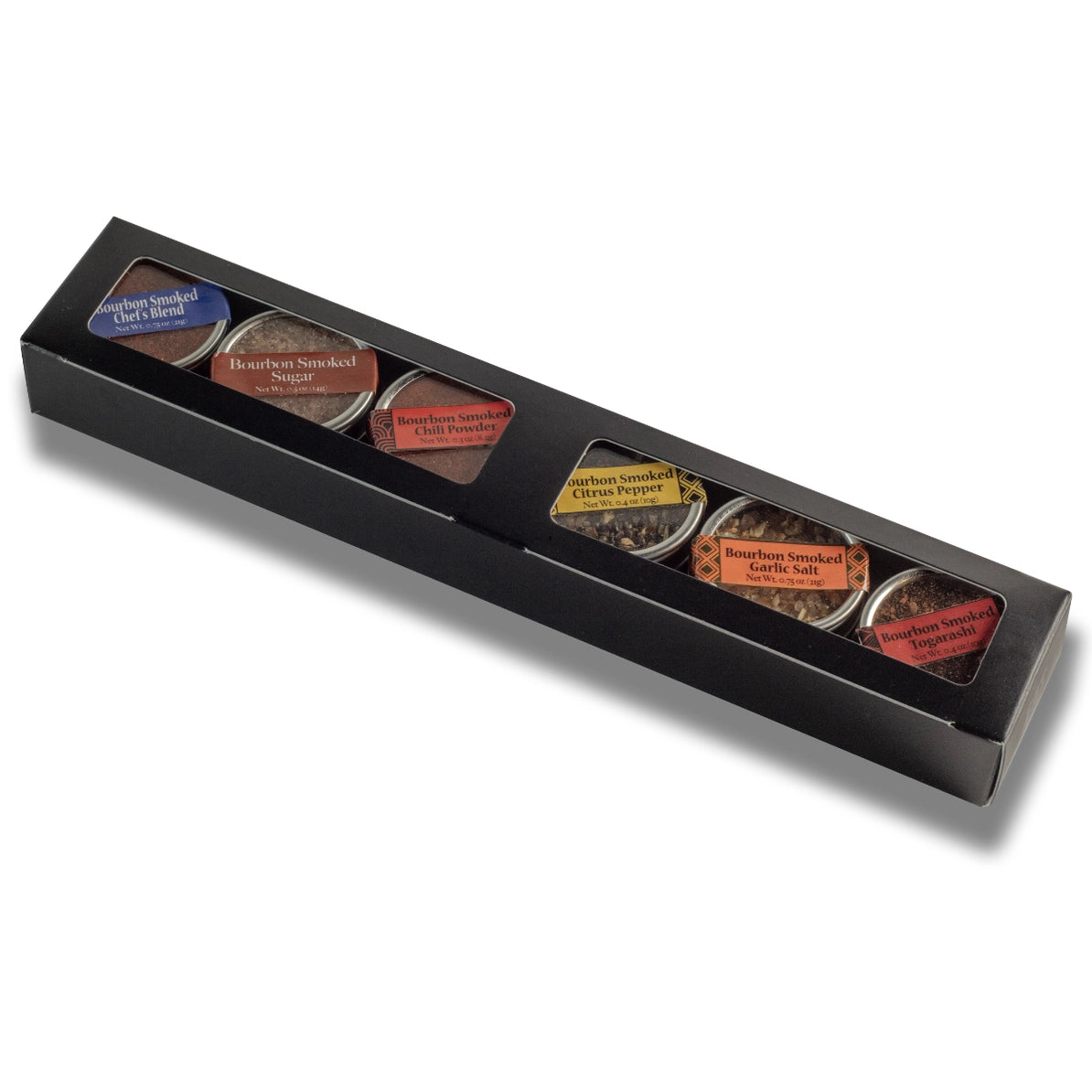 Set of tea bags in a black box on a white background
