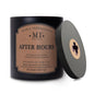 Manly Indulgence candle with label and lid on a white background