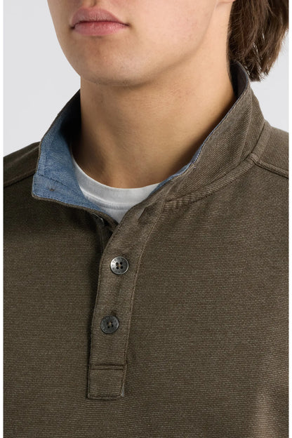 close up of button up sweatshirt 