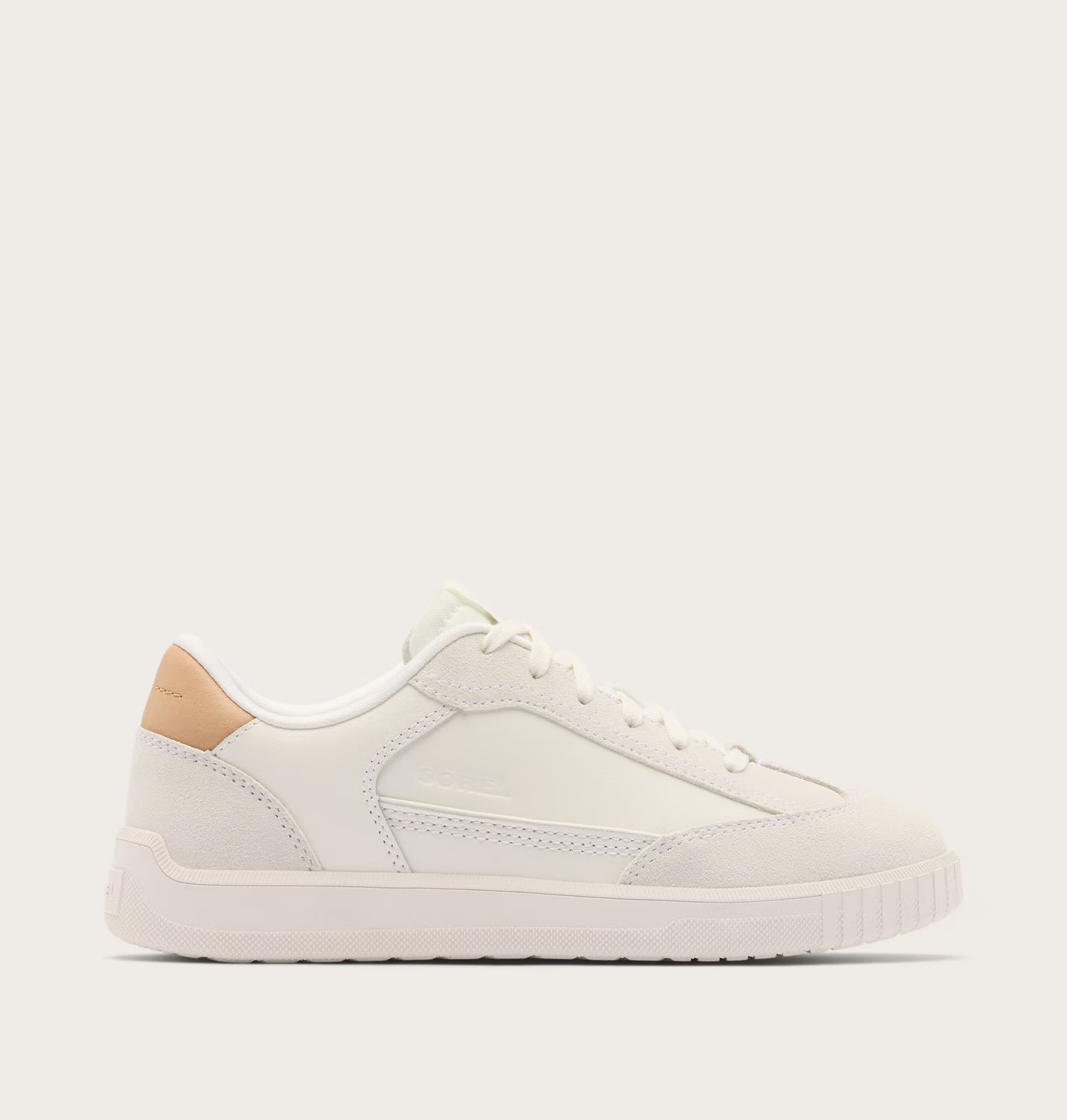 White sneaker with beige accents on a light gray background
