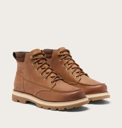 A pair of brown leather lace-up ankle boots with tan soles, displayed on a light beige background.