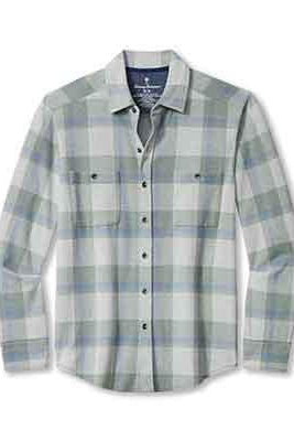 A long-sleeve button-up plaid shirt in white, light blue, and gray, featuring two chest pockets and a classic collar.