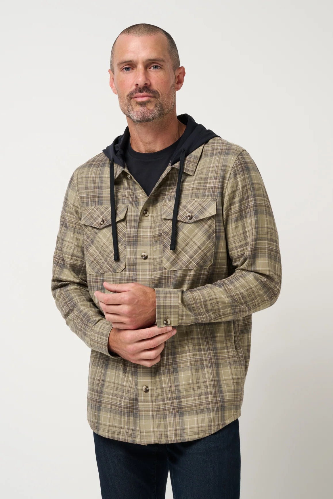 man in plaid hoodie