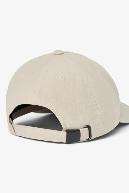 Beige baseball cap on a white background