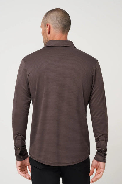 man in long sleeve polo