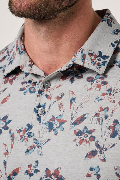 Floral patterned shirt with a collar on a light background