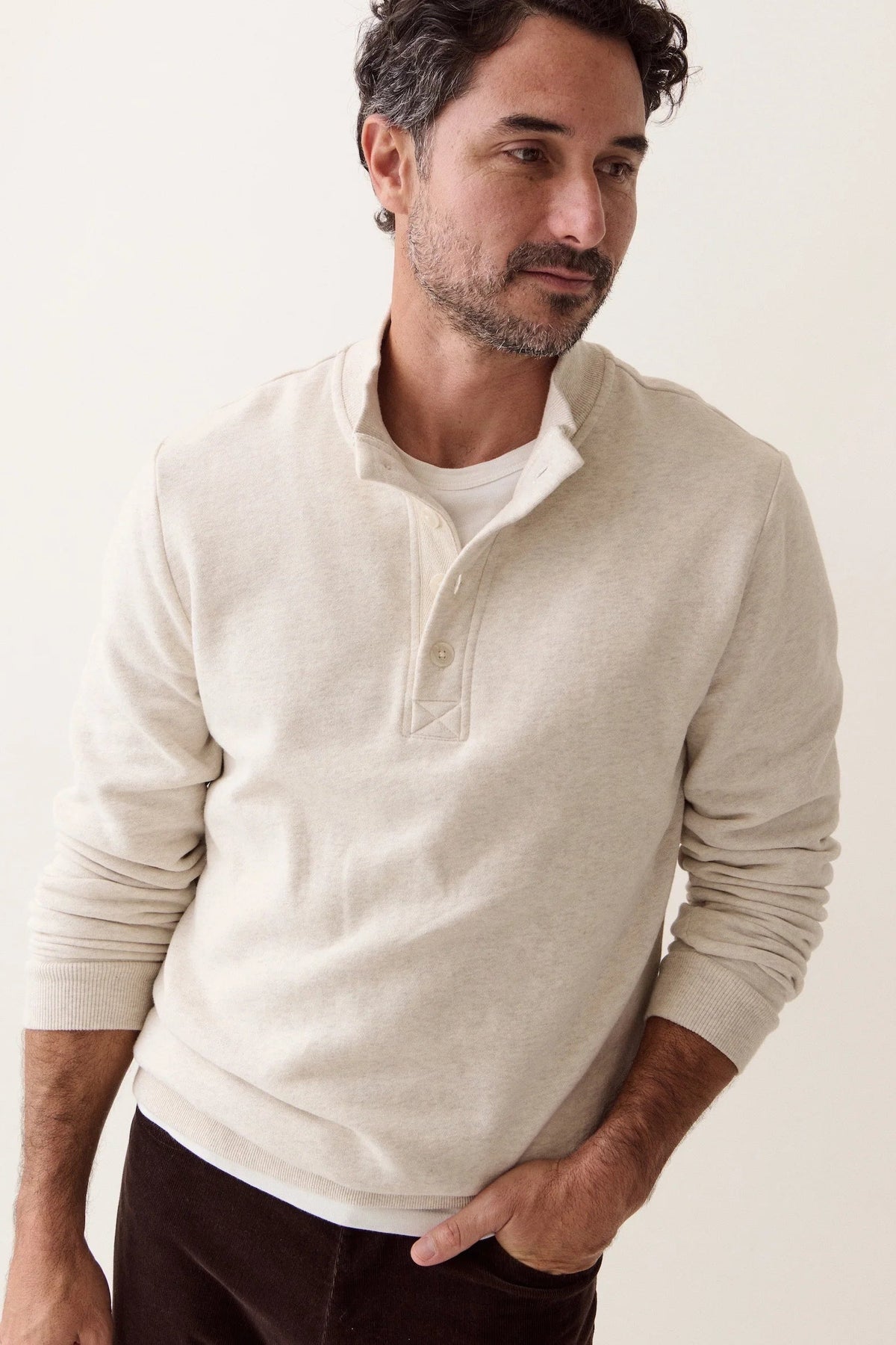 man wearing oatmeal color pullover