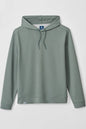 A sage green pullover hoodie with matching drawstrings, displayed flat against a light gray background. The hoodie features a small blue brand tag on the inside neck and a tiny white tag near the bottom hem.