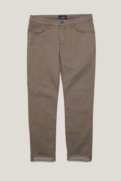 Brown pants on a light beige background