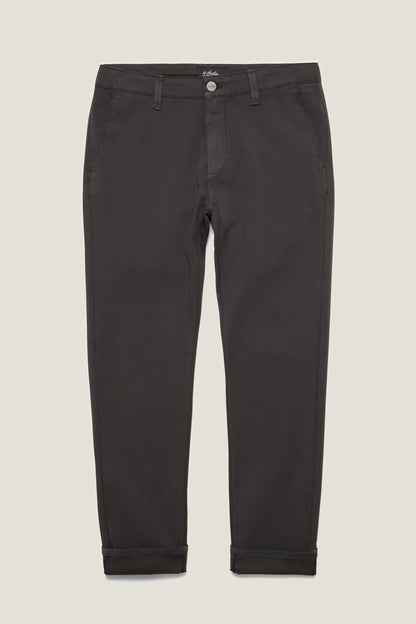Dark charcoal gray slim-fit trousers with rolled cuffs, shown flat against a light beige background.
