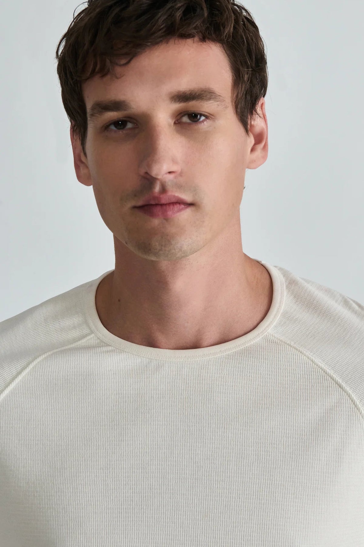 close up of man in white shirt 