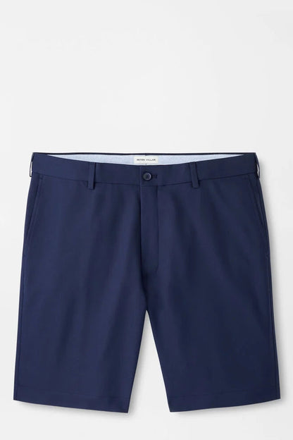Navy blue shorts on a light gray background