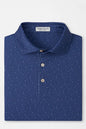 Blue polka dot polo shirt on a light gray background