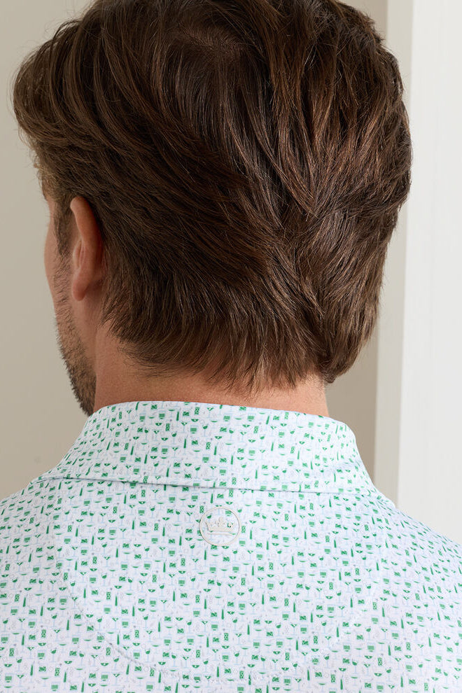 man wearing polo shirt showing the back neckline