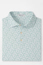Green patterned shirt on a light gray background