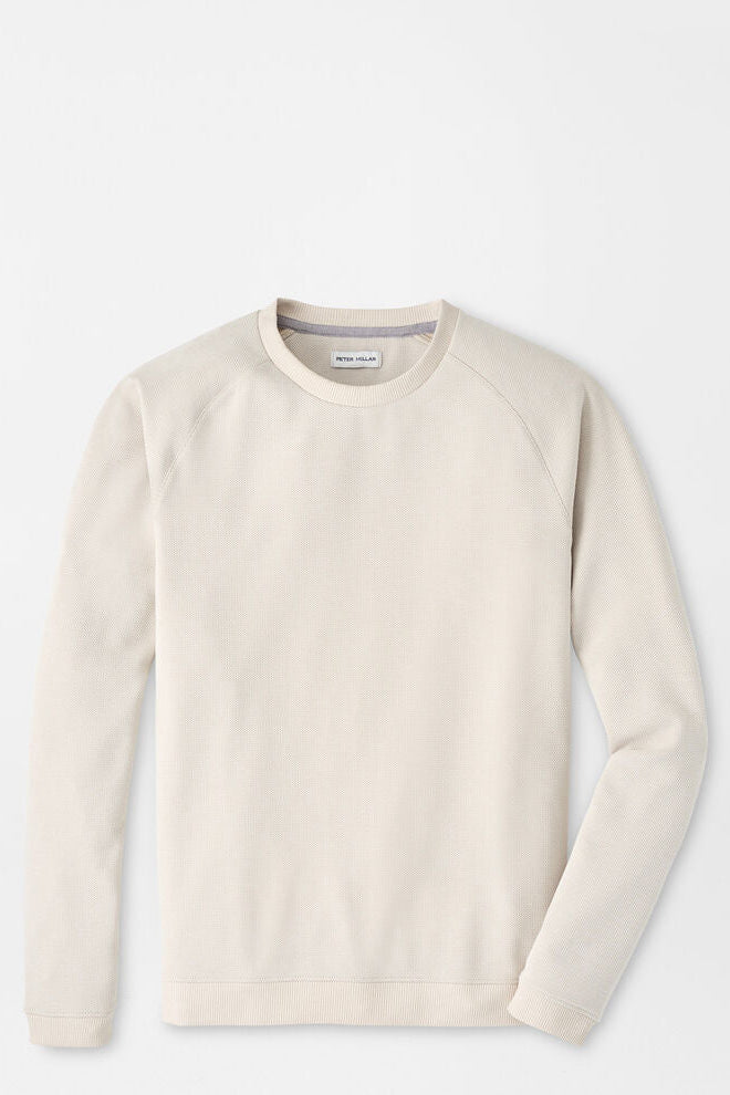 Beige sweater on a light gray background