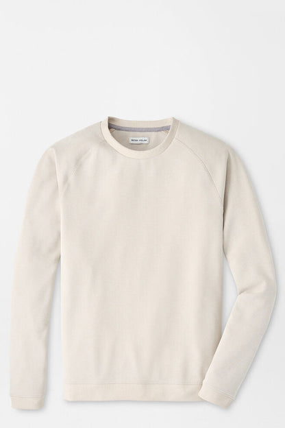 Beige sweater on a light gray background