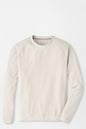 Beige sweater on a light gray background