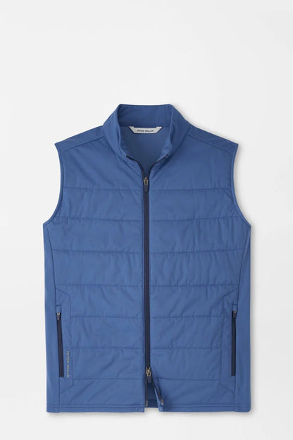 Blue puffer vest on a light gray background