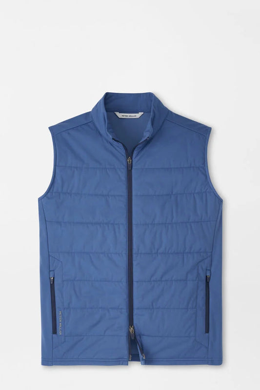 Blue puffer vest on a light gray background