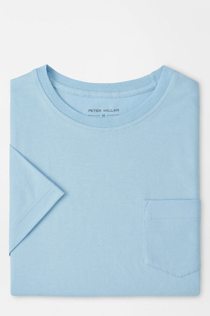 Light blue t-shirt with a pocket on a white background