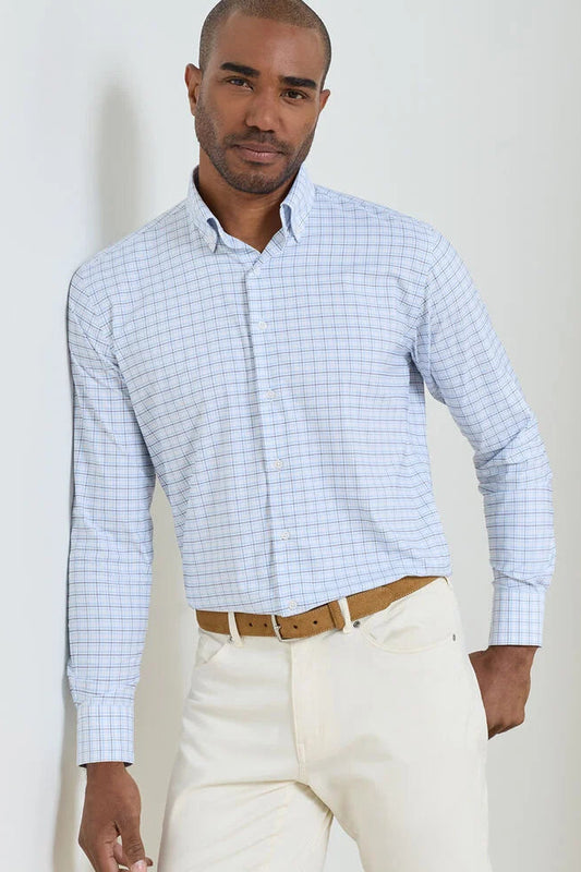 man wearing blue checkered dress shirt