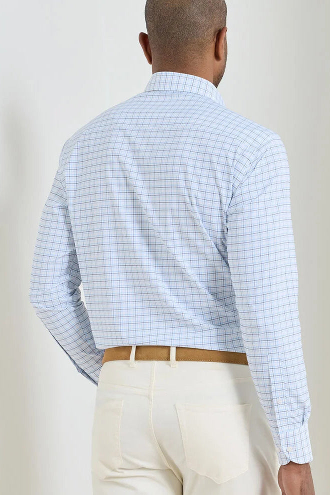 man wearing blue checkered dress shirt