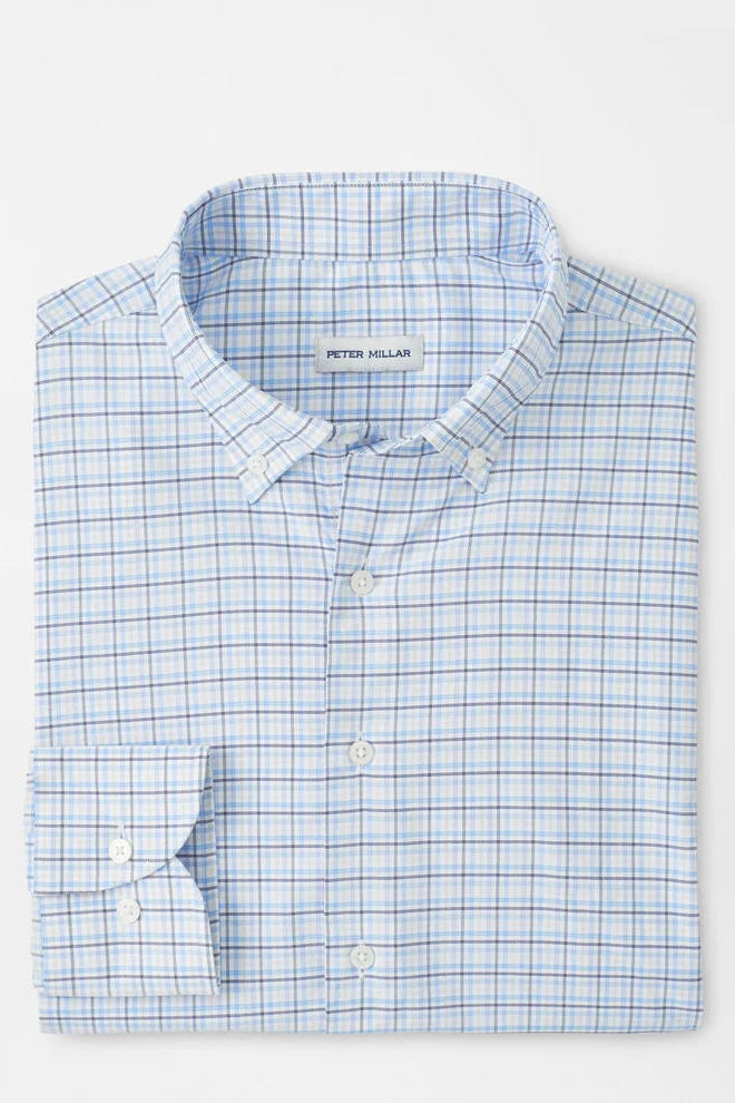man wearing blue checkered dress shirt