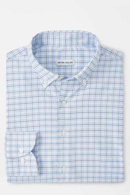 man wearing blue checkered dress shirt