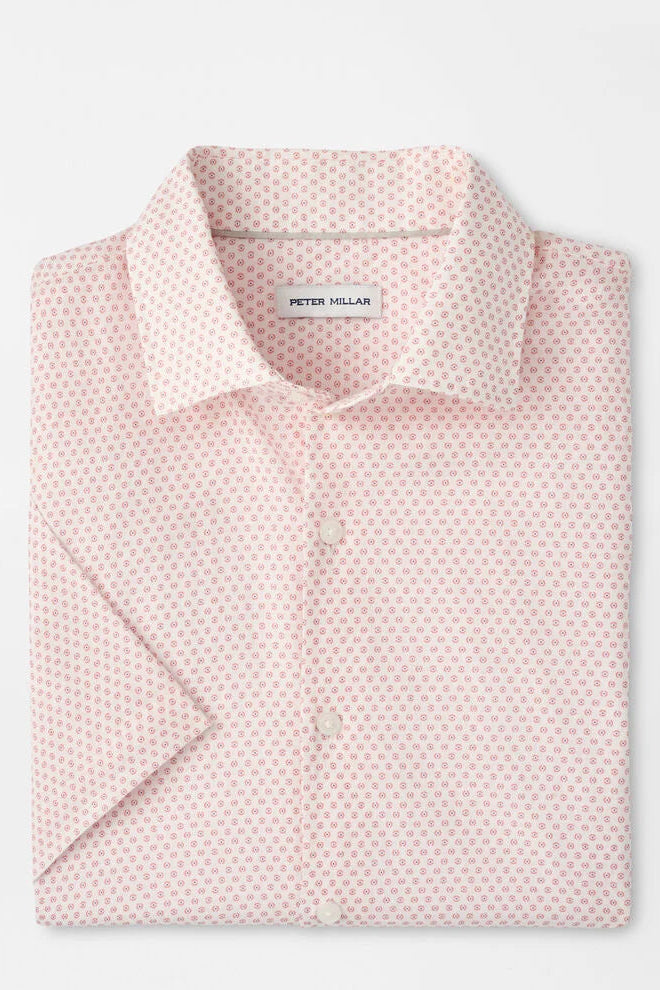Pink patterned shirt with Peter Millar label on a light gray background