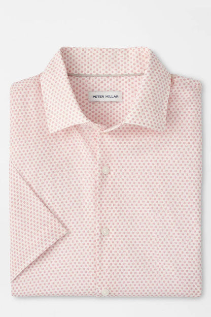 Pink patterned shirt with Peter Millar label on a light gray background