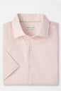 Pink patterned shirt with Peter Millar label on a light gray background