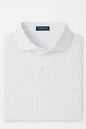 White polo shirt with subtle pattern on a light gray background
