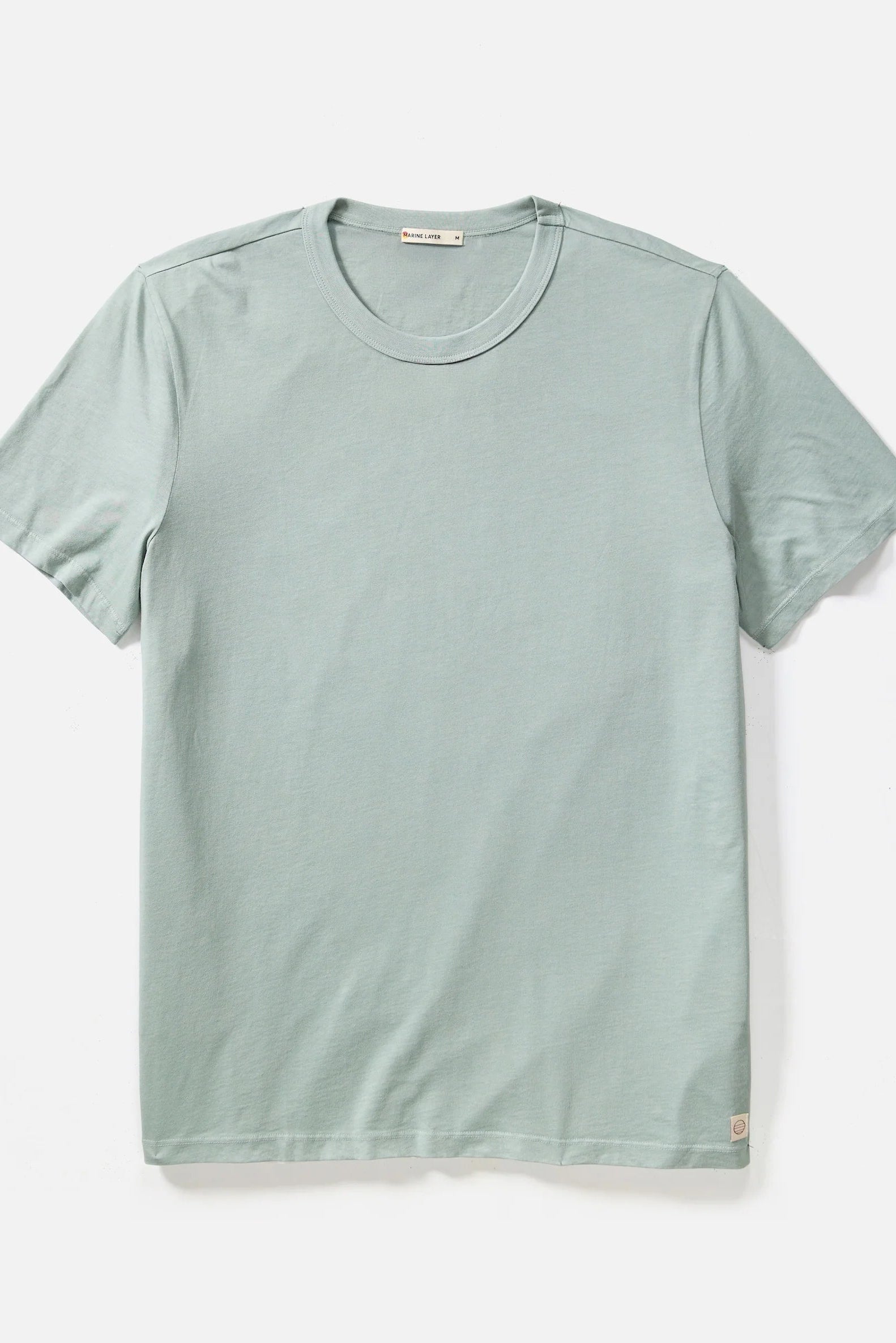 Light green t-shirt on a white background
