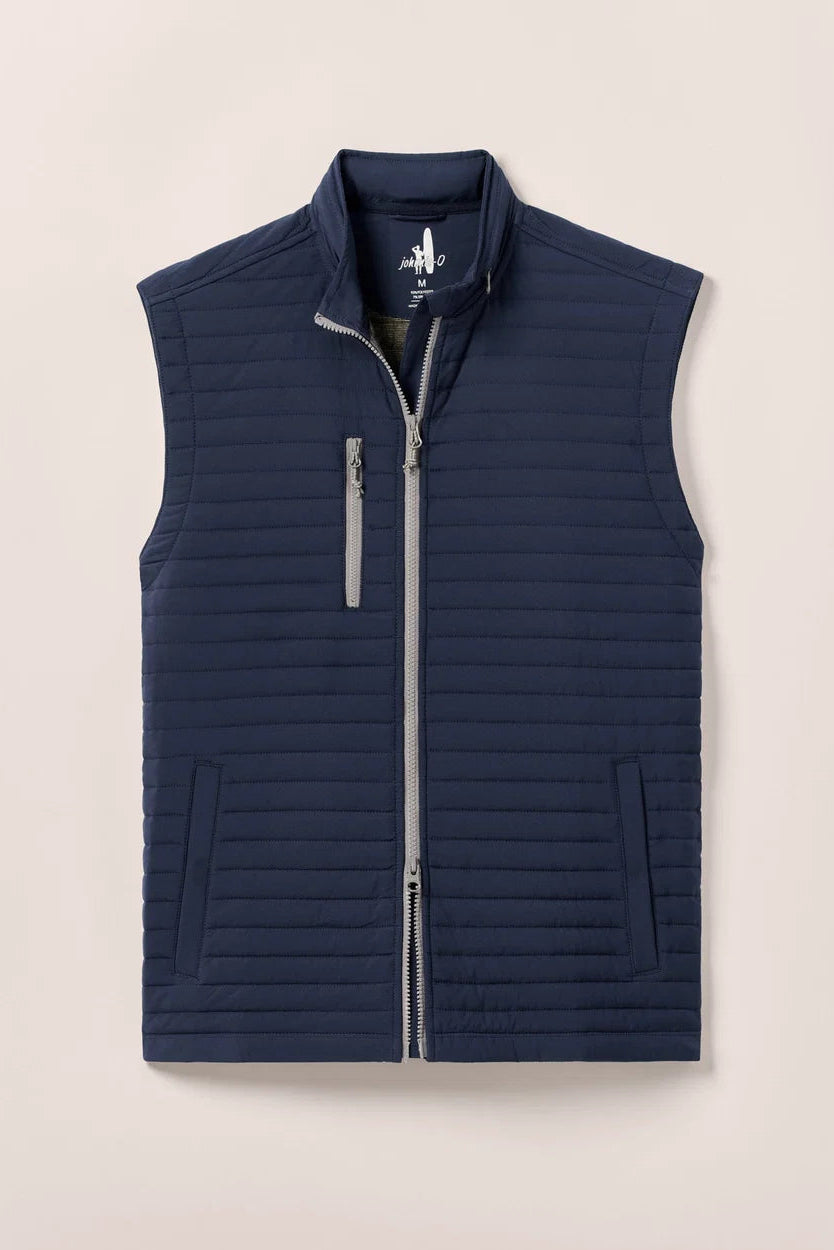 Navy blue vest with a brand logo on a light beige background