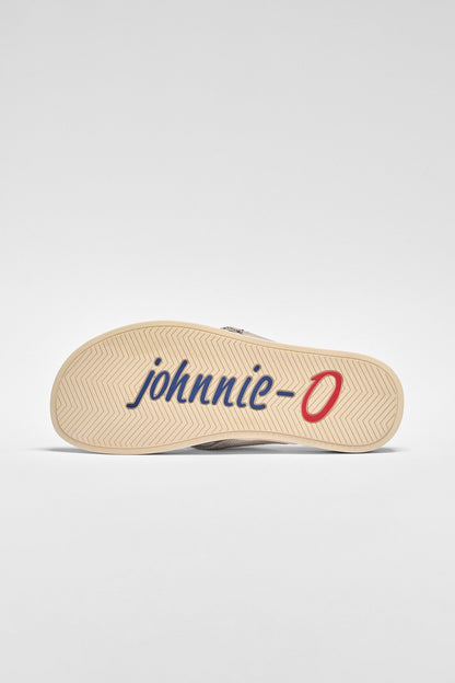 Sandal with 'johnnie-O' branding on a light gray background