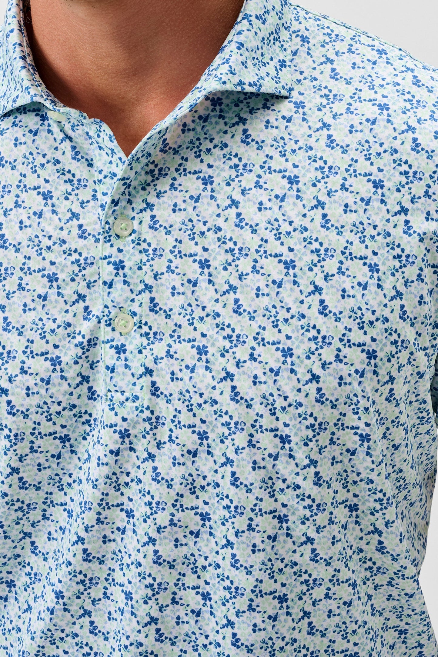Close-up of a blue and white floral patterned shirt
