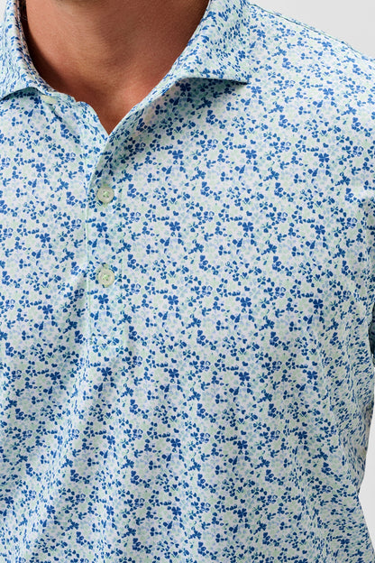 Close-up of a blue and white floral patterned shirt
