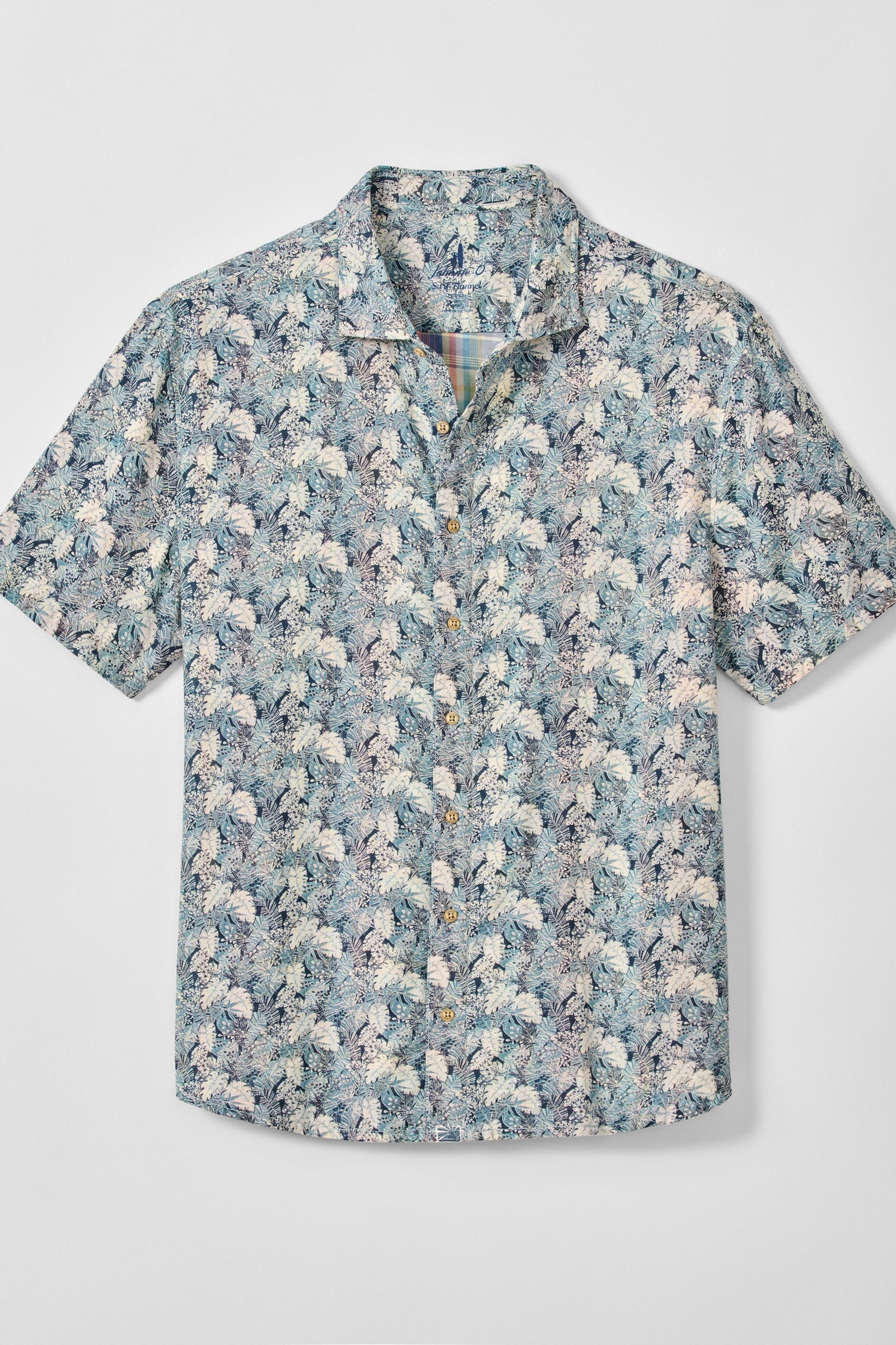 Floral patterned shirt on a light gray background