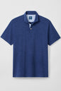 Blue polo shirt on a light gray background