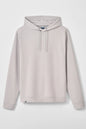 A light beige pullover hoodie with drawstrings, shown flat against a light gray background.