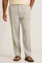 Light gray pants worn by a person on a white background
