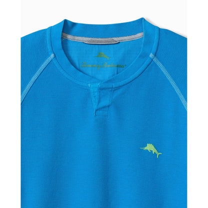 Blue shirt with a logo on a white background