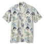 Short-sleeve shirt with tropical leaf pattern on a white background