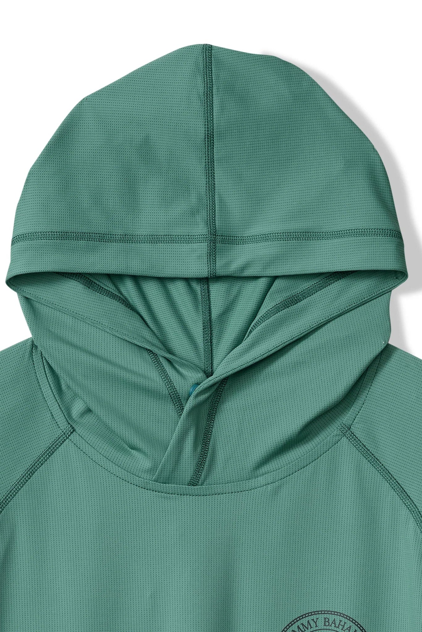 Green hooded top on a white background