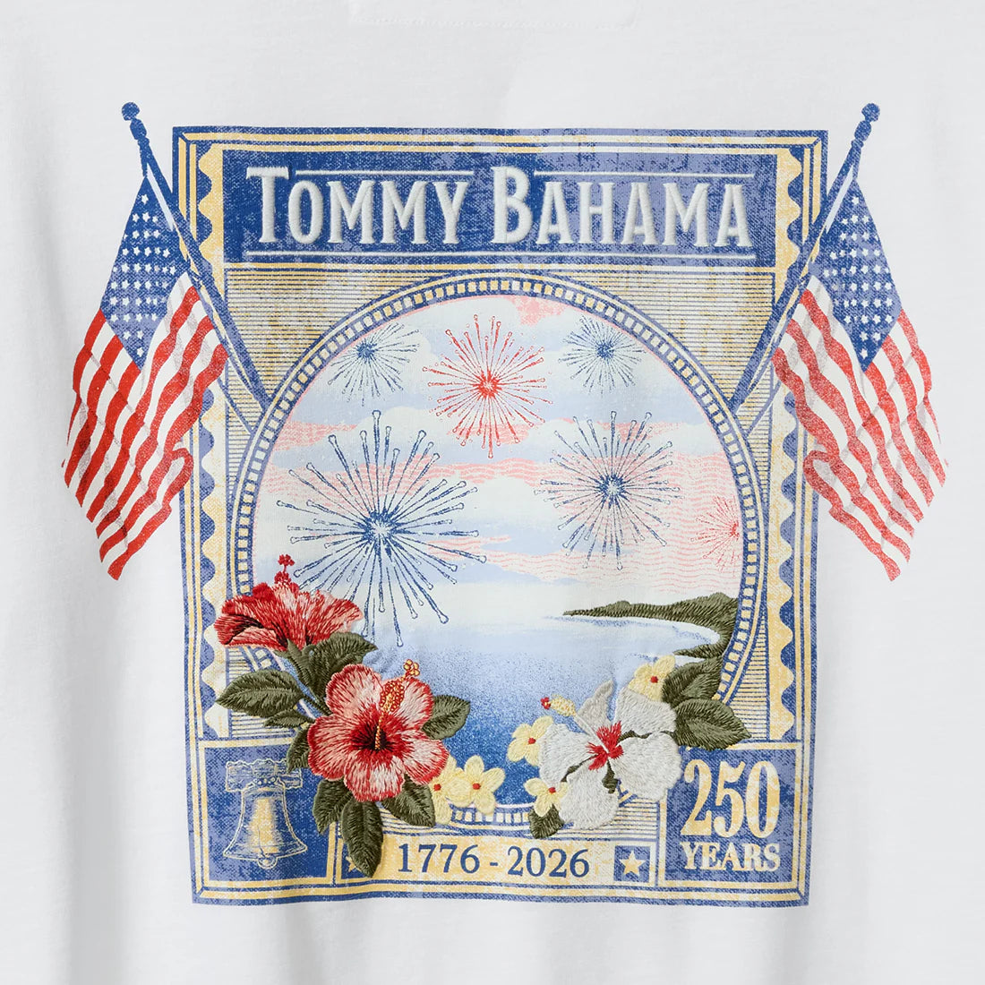 Tommy Bahama t-shirt with American flags, flowers, and a bell design on a white background.