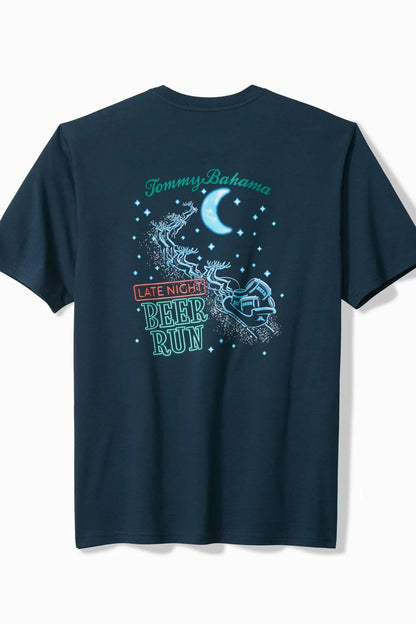 A navy blue short-sleeve t-shirt shown from the back, featuring a graphic print with a crescent moon, stars, and the text 'Tommy Bahama' and 'Late Night Beer Run' in light blue and red.