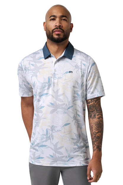 Man wearing a white polo shirt with blue accents and a logo on a white background