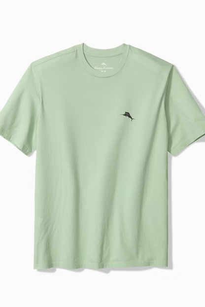 Light green t-shirt with a small black logo on a white background
